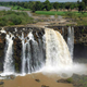 Illustration for article titled Why particles can travel up waterfalls, cheating gravity and common decency